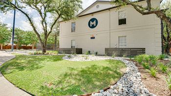 A building with a large M on it's side.